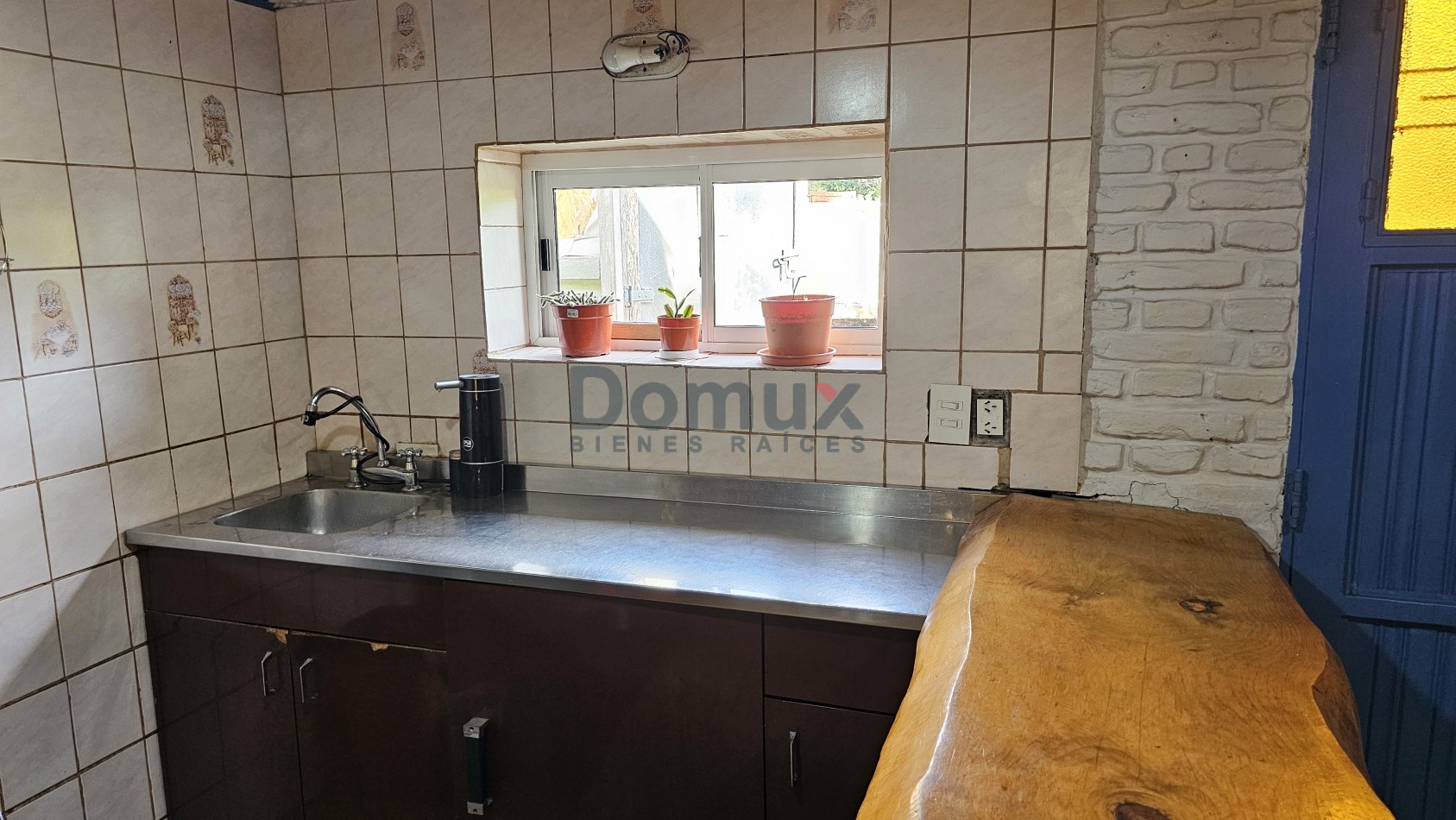 Amplio lote con casa