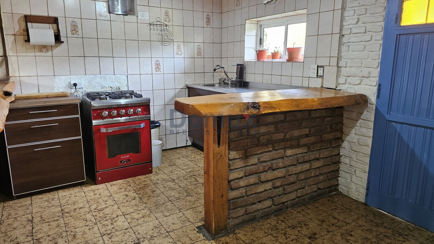 Amplio lote con casa