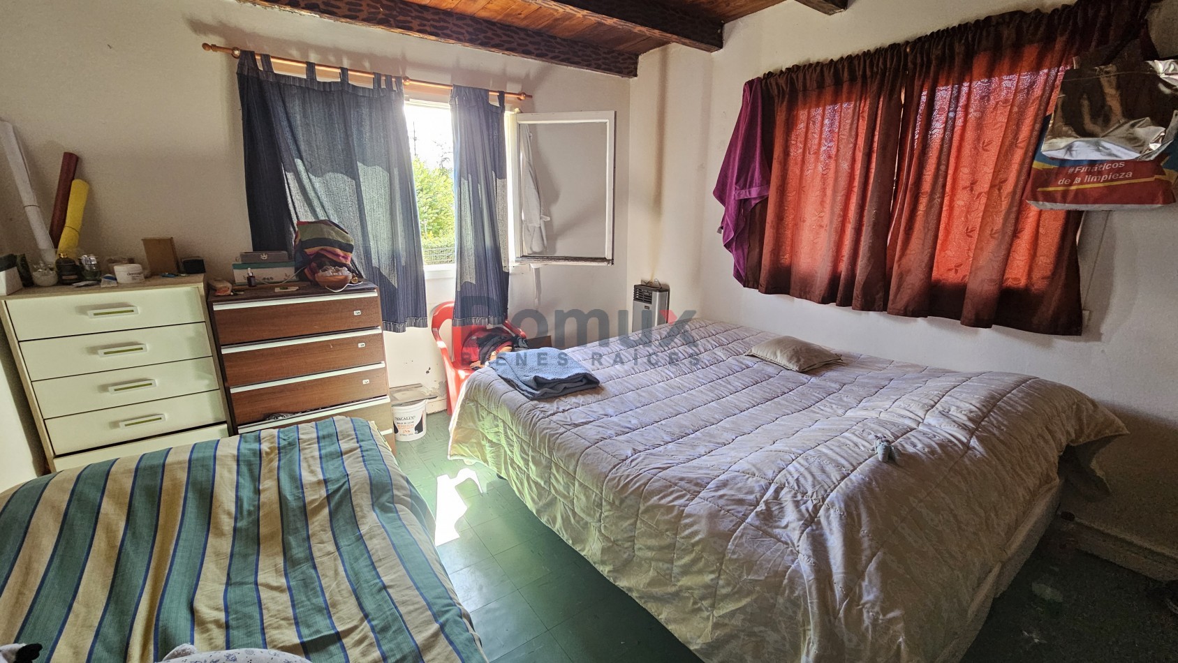 Amplio lote con casa