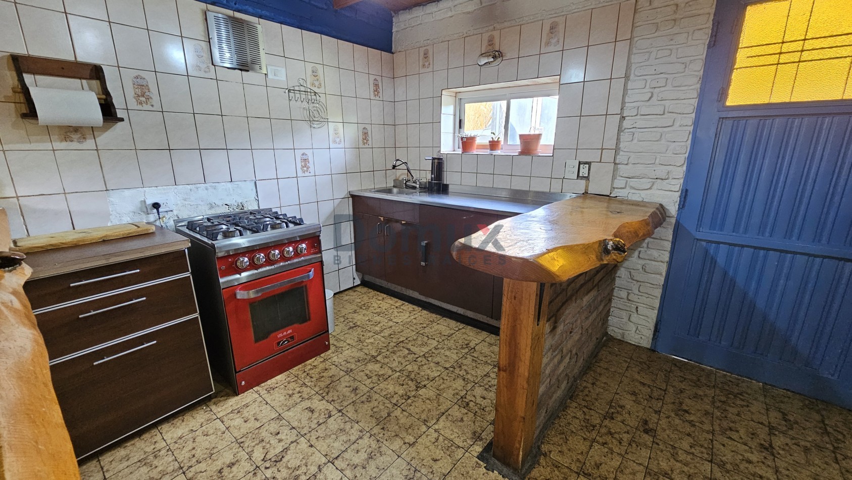 Amplio lote con casa